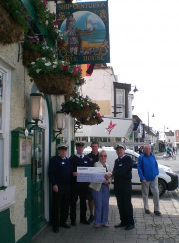 Receiving cheque from Ship Centurion